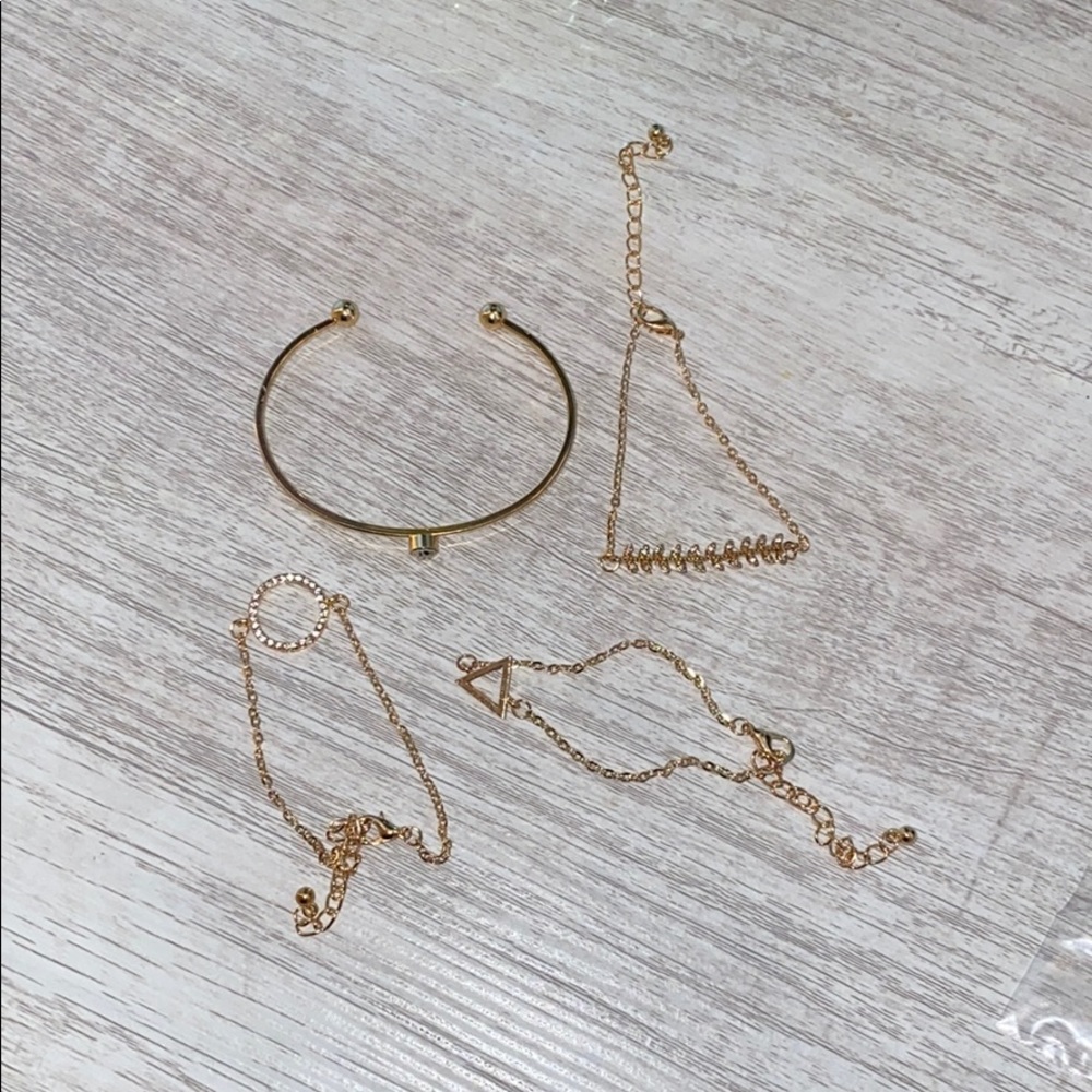 A set of 4 Gold bracelets.